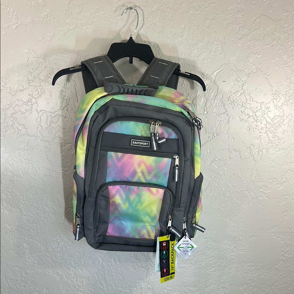Gray Backpack with Structured Design and Padded Straps
